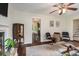 Inviting living room showcasing a fireplace, comfortable seating, and an open doorway at 2623 Riggs Dr, Atlanta, GA 30344