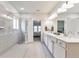 Modern bathroom featuring a spacious walk-in shower, double vanity, and access to the bedroom at 316 Denali Butte Ter, Canton, GA 30114
