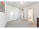 Bedroom boasting access to the bathroom, natural light, and double doors to a closet space at 316 Denali Butte Ter, Canton, GA 30114
