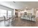 Open concept kitchen with bar seating and dining area at 316 Denali Butte Ter, Canton, GA 30114