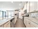 Modern kitchen featuring stainless steel appliances, custom cabinetry, and granite countertops at 316 Denali Butte Ter, Canton, GA 30114