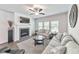 Cozy living room with fireplace, plush seating, and ample natural light at 316 Denali Butte Ter, Canton, GA 30114