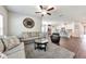 Open-concept living room showcasing modern decor and seamless flow into the kitchen area at 316 Denali Butte Ter, Canton, GA 30114