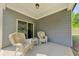 Relaxing outdoor patio with comfortable seating and peaceful views at 316 Denali Butte Ter, Canton, GA 30114
