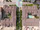 An aerial view shows the building complex and the swimming pool courtyard at 1075 Peachtree Ne Walk # A204, Atlanta, GA 30309