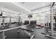 Fully-equipped gym featuring weights, benches, elliptical machines, and mirrored wall at 1075 Peachtree Ne Walk # A204, Atlanta, GA 30309