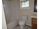 Bathroom featuring a toilet, tub, and vanity with a sink at 1119 Oakwood Manor Ct, Decatur, GA 30032
