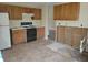 Kitchen featuring an oven, and upper cabinets at 1119 Oakwood Manor Ct, Decatur, GA 30032