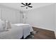 Bedroom featuring a ceiling fan and hardwood floors at 1766 Blossom Ln, Austell, GA 30168