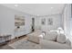 Comfortable living room featuring a modern design, stylish furnishings, and ample natural light at 1766 Blossom Ln, Austell, GA 30168