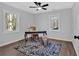 Office space with two bright windows and a ceiling fan at 1766 Blossom Ln, Austell, GA 30168