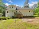 Back of home showing deck and large lot at 1822 Morgan Rd, Canton, GA 30115
