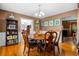 Formal dining room with wood table, chairs, and hardwood flooring at 1822 Morgan Rd, Canton, GA 30115
