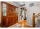 Inviting entryway featuring a wood door with glass panels and hardwood floors at 1822 Morgan Rd, Canton, GA 30115