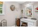 The powder room boasts decor and storage solutions, blending style with functional design at 1822 Morgan Rd, Canton, GA 30115