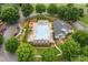 Aerial perspective of a community pool, tennis courts and clubhouse, ideal for active residents at 5415 Old Haven Ct, Cumming, GA 30041