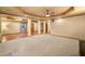 Large basement area with both carpet and hardwood floor and recessed lights at 5415 Old Haven Ct, Cumming, GA 30041
