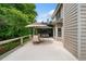 Spacious deck perfect for outdoor dining and relaxation, featuring an umbrella and comfortable seating at 5415 Old Haven Ct, Cumming, GA 30041