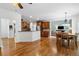 Modern kitchen with wood flooring offering stainless appliances and an open layout at 5415 Old Haven Ct, Cumming, GA 30041