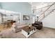 Bright living room offers an open floor plan, high ceilings, and plenty of natural light at 5415 Old Haven Ct, Cumming, GA 30041