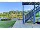 Basement patio with a lake view and stairs leading to the main deck at 1943 Blue Heron Way, Lawrenceville, GA 30043