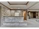 Finished basement featuring brick bar, neutral carpet and recessed lighting at 1943 Blue Heron Way, Lawrenceville, GA 30043