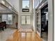 Grand foyer with gleaming hardwood floors and soaring ceilings showcasing an open floor plan at 1943 Blue Heron Way, Lawrenceville, GA 30043