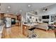 Spacious kitchen with island, stainless steel appliances, wood cabinets and hardwood floors at 1943 Blue Heron Way, Lawrenceville, GA 30043