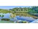Scenic view from the property overlooking a tranquil lake surrounded by lush trees at 1943 Blue Heron Way, Lawrenceville, GA 30043