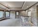 Unique living room with brick walls, neutral carpet, and a bar area, perfect for entertaining at 1943 Blue Heron Way, Lawrenceville, GA 30043