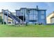 Expansive two-story home with blue siding and an outdoor deck at 1943 Blue Heron Way, Lawrenceville, GA 30043
