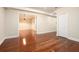 Spacious basement with hardwood floors and an open doorway to an adjacent room at 3492 Ember St, Marietta, GA 30066