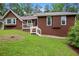 Charming single-Gathering home with a well-manicured lawn, inviting bay window and a classic, brown exterior at 3492 Ember St, Marietta, GA 30066
