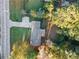 Aerial view of the home showcasing its layout, driveway, and surrounding trees at 4781 Brownsville Rd, Powder Springs, GA 30127