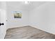 Cozy bedroom with new flooring, fresh paint, and a bright window offering great natural light at 4781 Brownsville Rd, Powder Springs, GA 30127