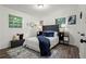 Cozy bedroom with a comfortable bed, stylish decor, and bright natural light, creating a relaxing retreat at 4781 Brownsville Rd, Powder Springs, GA 30127