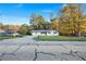 Charming home with mature trees, providing a serene and private setting at 4781 Brownsville Rd, Powder Springs, GA 30127