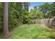A mature landscaped backyard with new fence at 6134 Silver Spur Dr, Lithonia, GA 30058