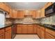 Kitchen featuring stainless steel appliances and beautiful stone backsplash at 6134 Silver Spur Dr, Lithonia, GA 30058