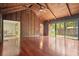 Spacious living room features wood-paneled vaulted ceilings, and natural light at 6134 Silver Spur Dr, Lithonia, GA 30058