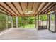 Screened porch with ceiling fan at 6134 Silver Spur Dr, Lithonia, GA 30058