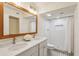 Modern bathroom with double sinks, a large mirror, and a tiled walk-in shower at 104 Verlaine Nw Pl, Atlanta, GA 30327