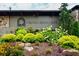 Charming Cross Creek Cafe entrance surrounded by colorful flower beds and lush greenery at 104 Verlaine Nw Pl, Atlanta, GA 30327
