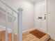 Entryway with hardwood floors and white front door at 104 Verlaine Nw Pl, Atlanta, GA 30327