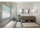 Elegant bathroom featuring a double vanity, stylish tile work, and a modern glass shower at 112 Pebblebrooke Run, Canton, GA 30115