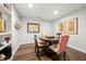 Dining area featuring stylish chairs and unique art at 112 Pebblebrooke Run, Canton, GA 30115