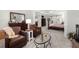 Spacious main bedroom features a sitting area, fireplace, and ensuite bathroom at 112 Pebblebrooke Run, Canton, GA 30115
