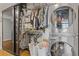 Organized closet with built-in shelving and a stacked washer and dryer for convenient laundry access at 130 26Th St # 706, Atlanta, GA 30309