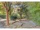 Landscaped garden area with walking path and natural stone accents at 130 26Th St # 706, Atlanta, GA 30309