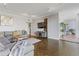 Cozy living room featuring hardwood floors, stylish furnishings, and plenty of natural light at 130 26Th St # 706, Atlanta, GA 30309